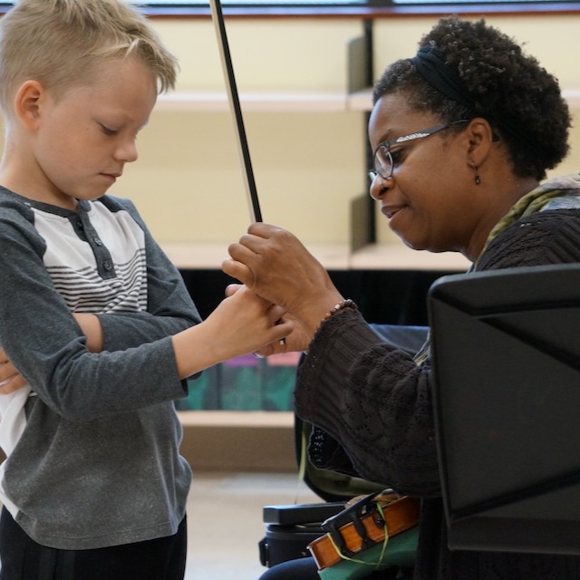 Anna Hughes teaching a student